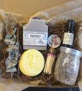 Amethyst Crystal Ritual Kit with amethyst crystal soap, essential oils, and other items on a textured surface