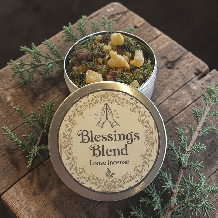 Blessings loose incense on a wooden surface with greenery.