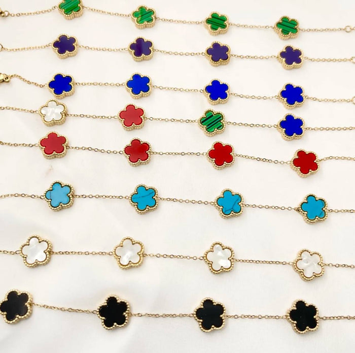 Bracciale Vintage Ambra a 4 motivi effetto madreperla con pietre nei colori nero, bianco, blu, verde e rosso - Iride Shop Bijoux e Accessori