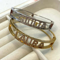 Braccialetto a manetta rigida personalizzabile in acciaio inossidabile, con una galvanica in oro 18k e pietre a taglio brillante, nei colori oro e argento - Iride Shop Bijoux e Accessori