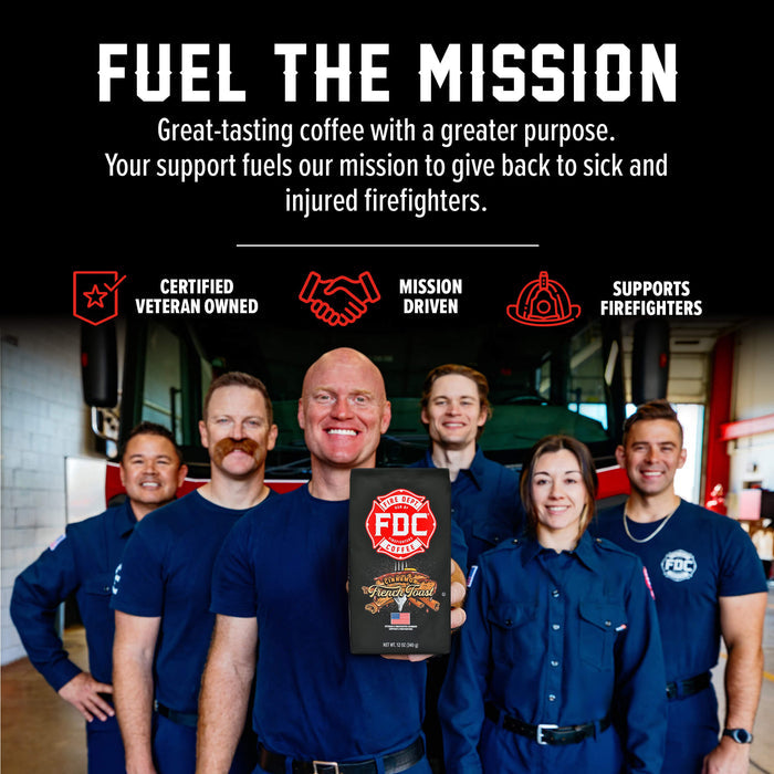 A group of firefighters in navy blue uniforms stand in a fire station holding a FDC Fire Department Anniversary plaque, with a black background and white and red promotional text above them.