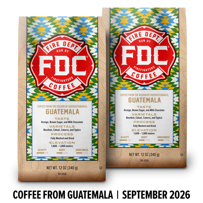 Two FDC Coffee packages shown side by side on a white background, with a black text banner at the bottom reading 'COFFEE FROM GUATEMALA | SEPTEMBER 2026'. The packages feature a colorful geometric pattern and a large red FDC logo.