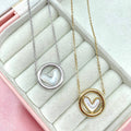 Collana con cuore incastonato written