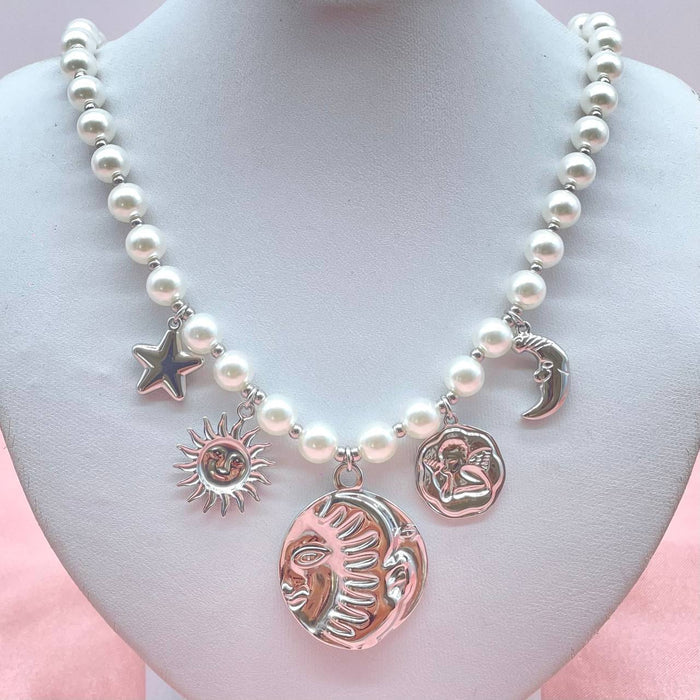 Collana in perle con elementi  astrali - Iride Shop - Accessori da Donna