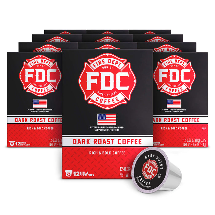 Multiple boxes of FDC Fire Department Coffee with a single cup on a white background