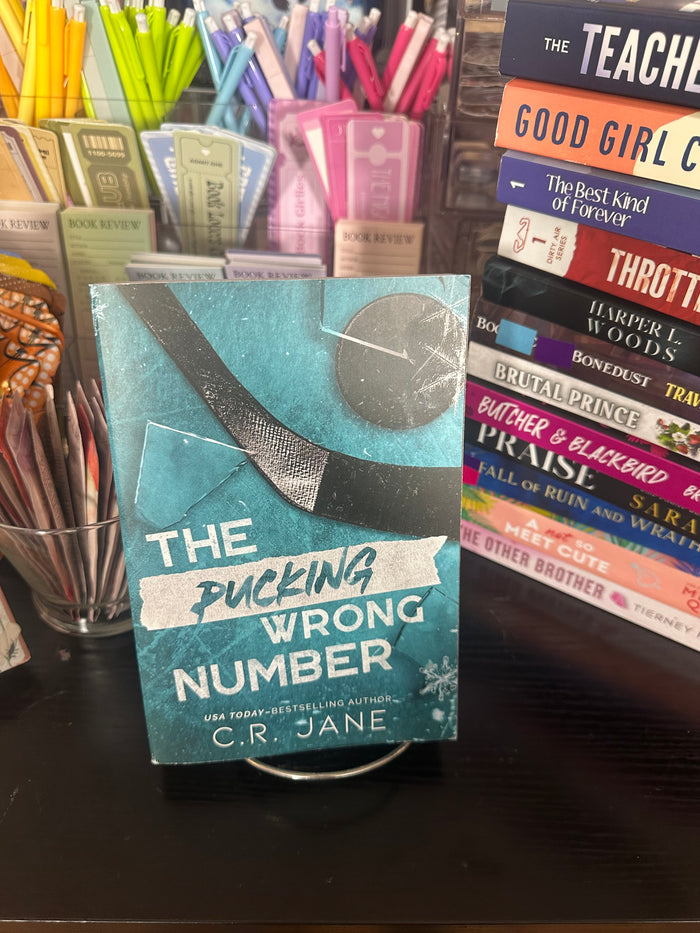 Dark Romance: The Pucking Wrong Number by C.R. Jane
