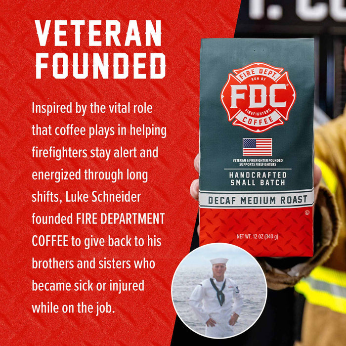 A bag of FDC Fire Department Coffee, Decaf Medium Roast, held by a person against a red promotional graphic with text reading 'VETERAN FOUNDED' and a circular inset photo of a sailor.