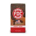 A 12 ounce package of Fire Department Coffee's Donut Shop Coffee on a white background.