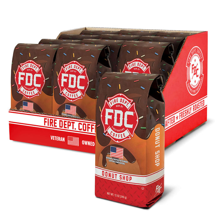 Packaging of Fire Dept. Coffee with 'Donut Shop' flavor on a white background