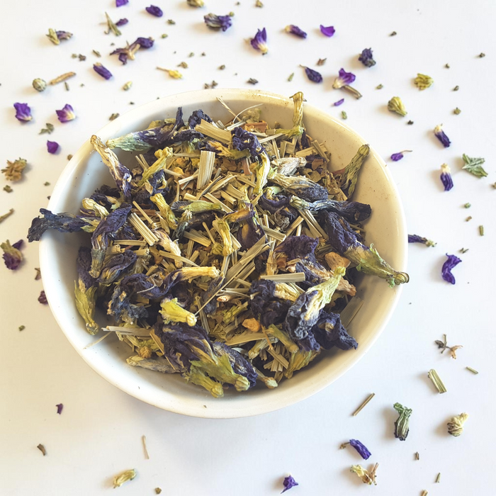 loose leaf energy cleanse tea blend on a light background
