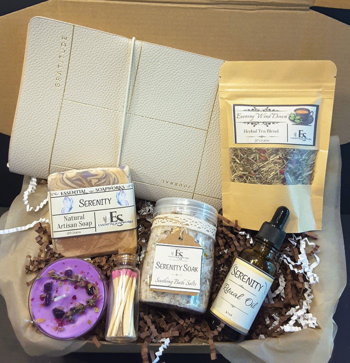Evening Wind Down Ritual Kit featuring soap, tea, candle, essential oil blend, journal and bath salts