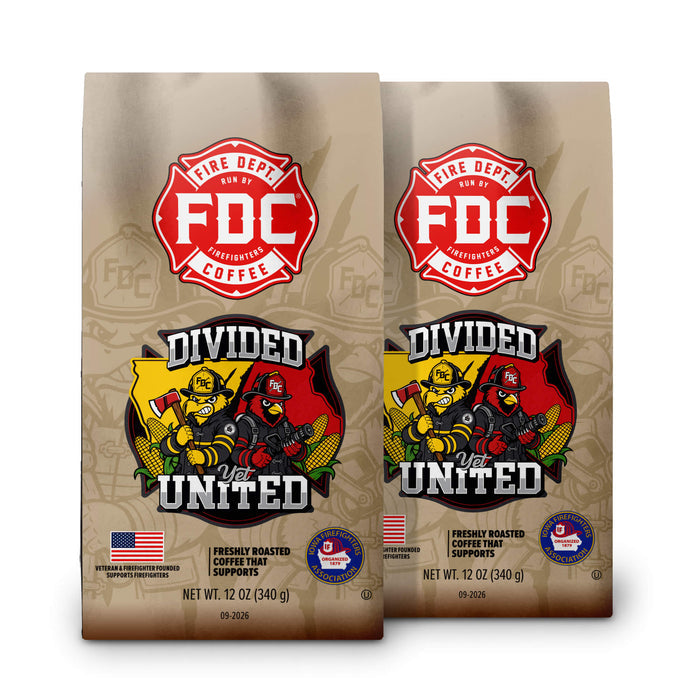 Two bags of FDC Fire Department Coffee 'Divided vs United' coffee beans on a white background.