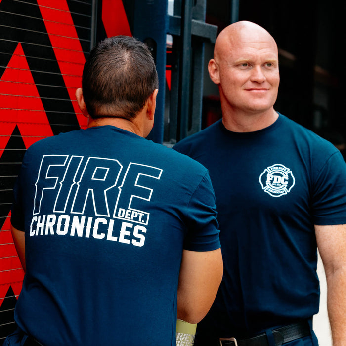 Front and back of the Navy Fire Department Chronicles Shirt