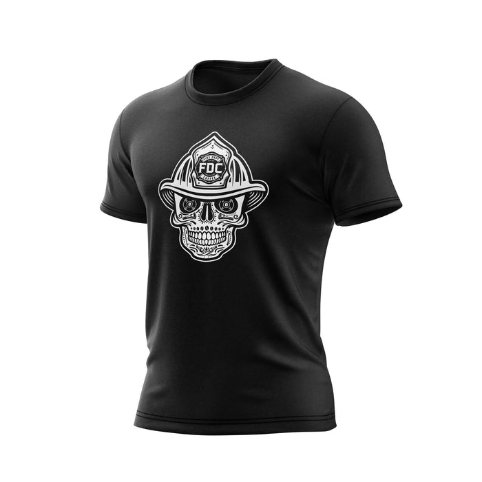 A black t-shirt with a white skull design wearing a fire helmet on a white background