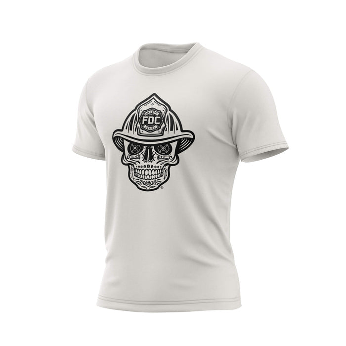 A vintage white t-shirt with a black skull design wearing a fire helmet on a white background