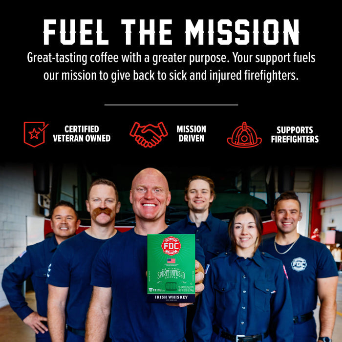 A group of smiling firefighters in navy uniforms stand in a garage-like setting while holding a green box of PFC Smokeless Irish Whiskey. Above them, bold white text reads 'FUEL THE MISSION' with supporting callouts: 'Certified Veteran Owned,' 'Mission Driven,' and 'Supports Firefighters.