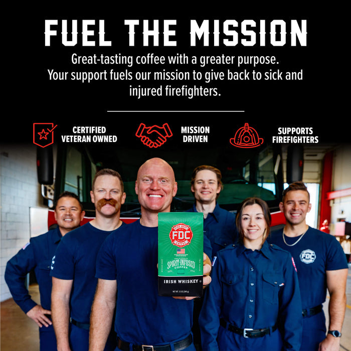 A group of firefighters in navy uniforms stand in a fire station holding a green and black FDC Spirit Whiskey package, with promotional text above reading 'FUEL THE MISSION' and feature icons for veteran ownership, mission-driven support, and firefighter support.