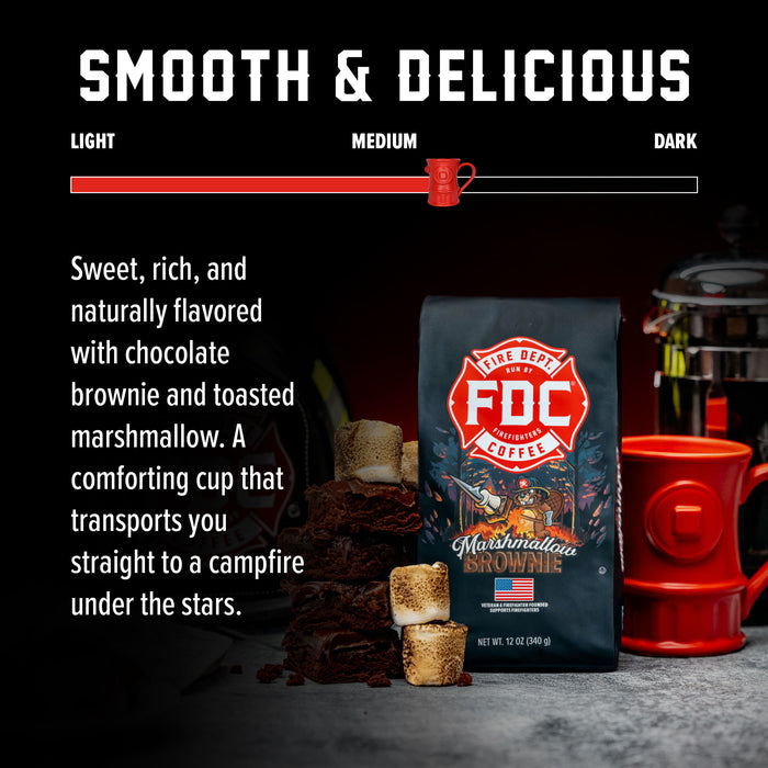 FDC Coffee Marshmallowed Coffee bag shown on a dark promotional background with a red coffee mug, stacked chocolate brownies, marshmallows, and a coffee maker. Text at the top reads 'SMOOTH & DELICIOUS' with a light-to-dark coffee strength slider.
