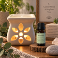 Mindful essential oil diffuser blend on a wooden surface alongside an essential oil burner