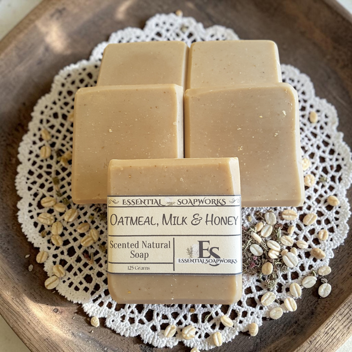 oatmeal soap on lace fabric with rolled oats