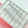 Orecchini pendent triple strass
