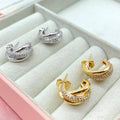 Orecchini triple luxury bril