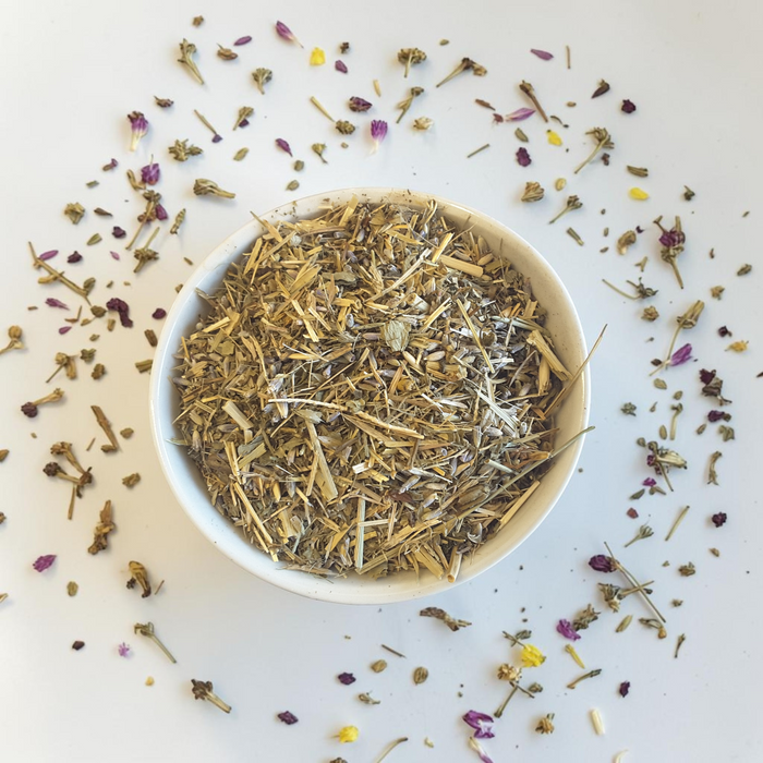 Loose leaf Quiet Mind tea blend on a light background