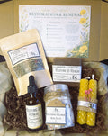 Restoration & Renewal Emotional Balance Ritual Kit with soap, bath salts, tea blend, essential oil blend, and candles