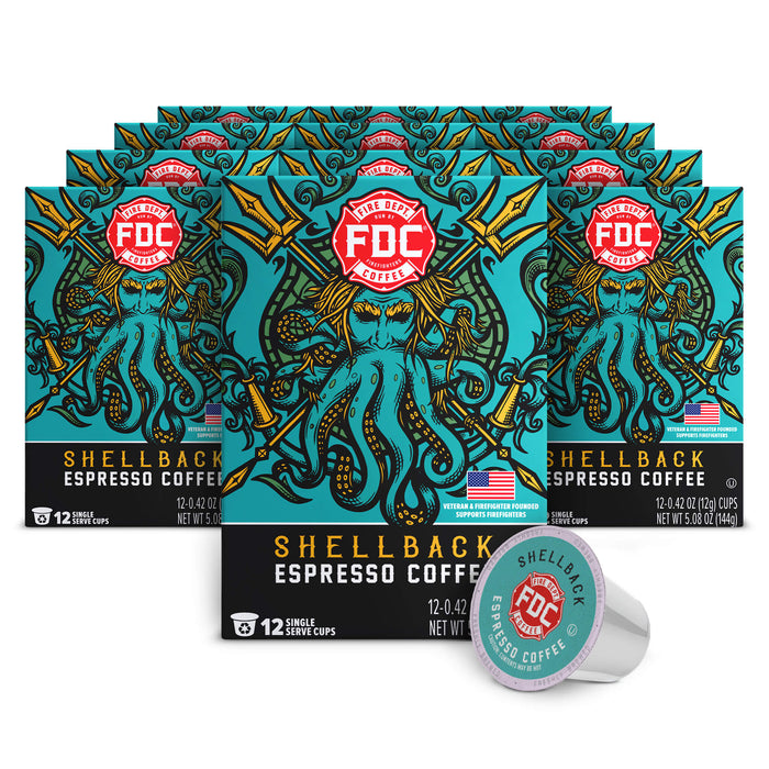 Multiple boxes of FDC Shellback Espresso Coffee with a single pod in front on a white background