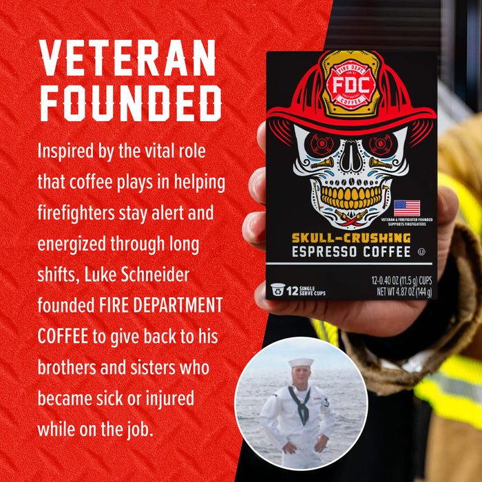 A hand holds a box of Fire Department Coffee 'Skull-Crushing Espresso Coffee' against a red textured background with white text reading 'VETERAN FOUNDED' and a short descriptive blurb. The box features a skull wearing a firefighter helmet, and a small circular inset photo shows a man in a white sailor uniform.