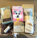 Somatic Self-Care Ritual Kit featuring Balance Soap bar, herbal tea, essential oil rollerball, bath salts, exfoliating body brush and socks