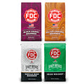 Four packages of FDC Coffee with different flavors on a white background.