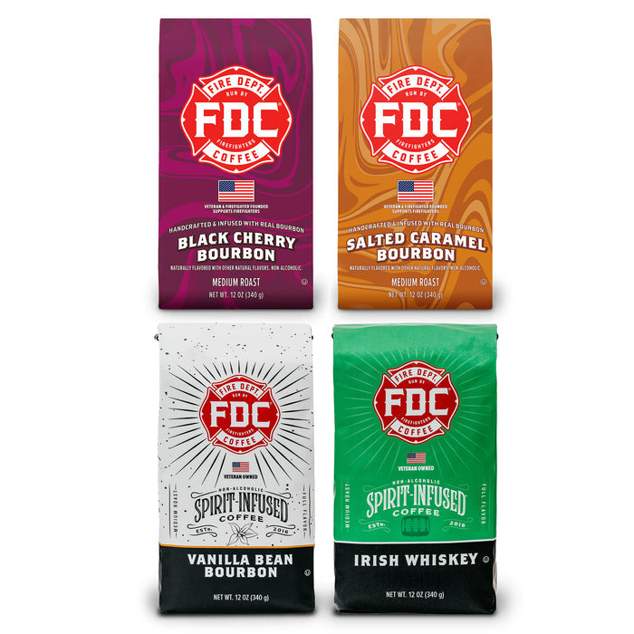 Four packages of FDC Coffee with different flavors on a white background.