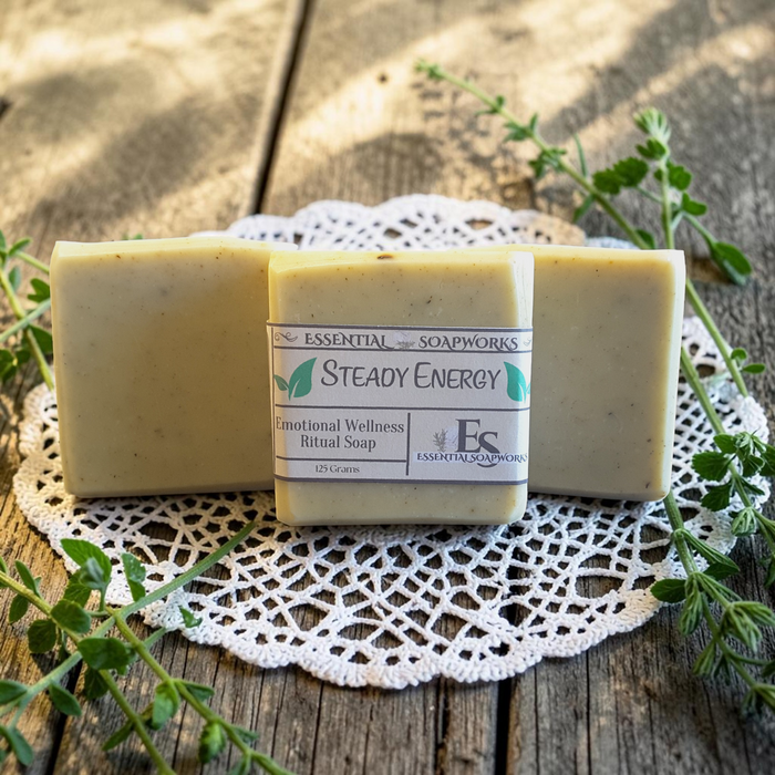 Steady Energy Emotional Wellness Soap on a wooden surface with greenery