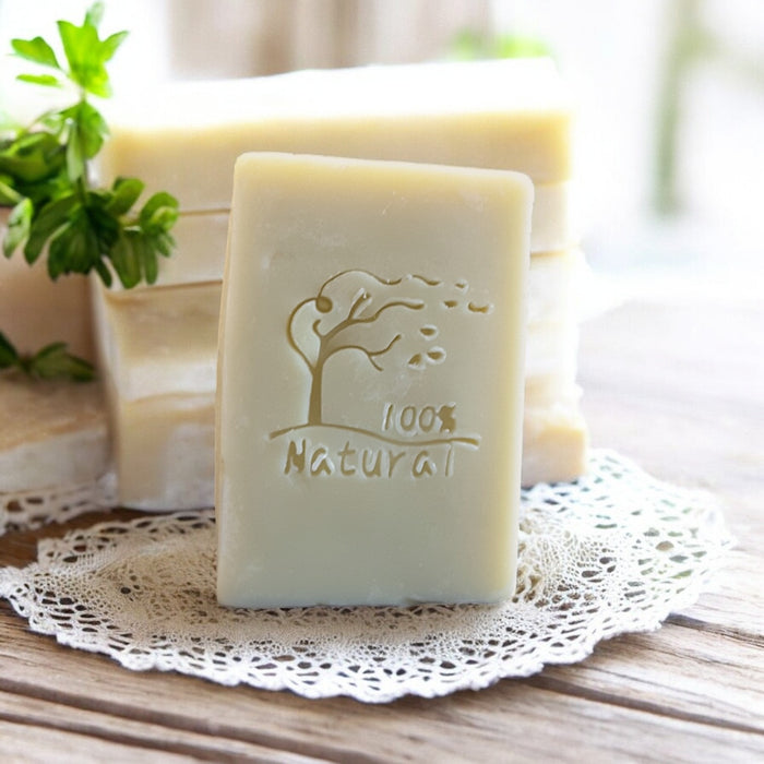tea tree vegan soap with '100% Natural' engraving on a lace doily