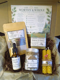 Worthy & Whole Emotional Balance Ritual Kit with tea, essential oil blend, soap, bath salts and candles in a box